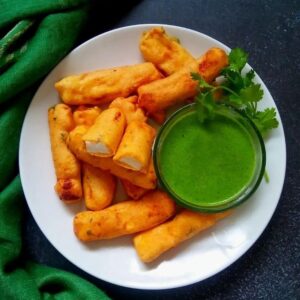 Fried paneer cubes with mint chutney in Cambridge, Ma