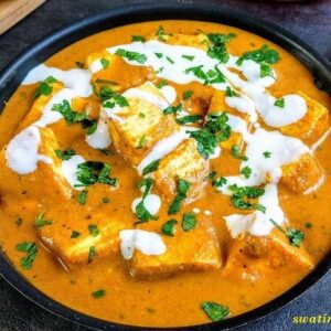 Creamy Shahi Paneer garnished with coriander and cream in CAmbridge, Ma