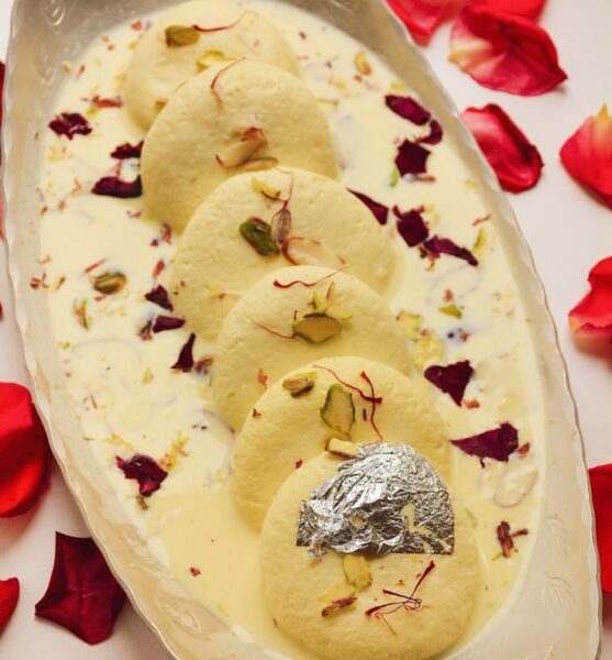 Creamy rasmalai topped with saffron strands and crushed pistachios in Cambridge, Ma